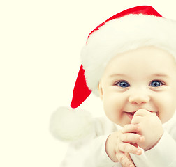 Image showing happy baby in santa hat