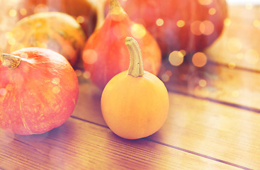 Image showing close up of pumpkins on wooden table at home