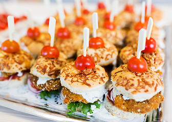 Image showing close up of canape hamburgers on serving tray