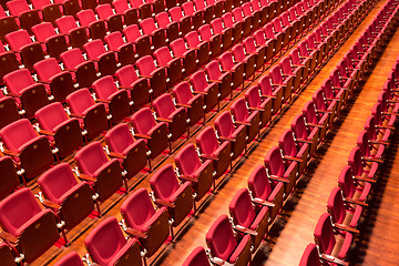 Image showing Red color theatre chair in conference room.