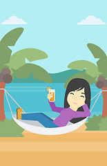 Image showing Woman chilling in hammock.