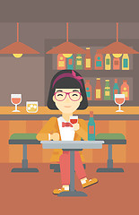 Image showing Woman drinking wine at restaurant.