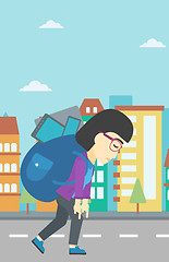 Image showing Woman with backpack full of electronic devices.