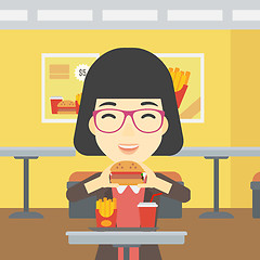 Image showing Woman eating hamburger vector illustration.