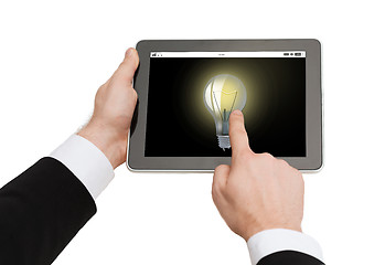 Image showing close up of man hands holding tablet pc