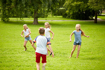 Image showing happy kids running and playing game outdoors
