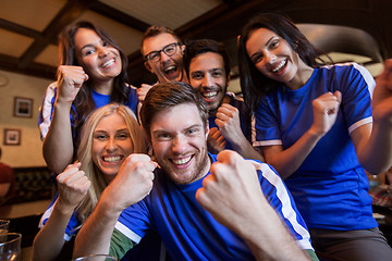 Image showing football fans or friends with beer at sport bar