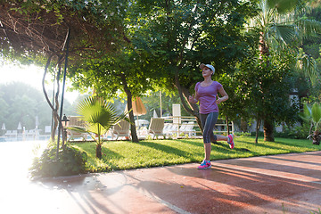 Image showing sporty woman jogging