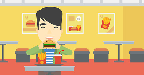 Image showing Man eating hamburger vector illustration.