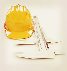 Image showing Vernier caliper and yellow hard hat 3d . 3D illustration. Vintag