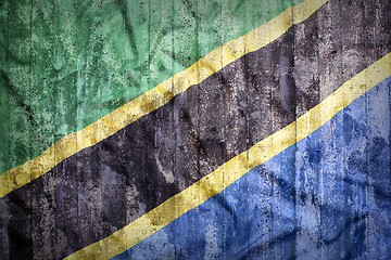 Image showing Grunge style of Tanzania flag on a brick wall     