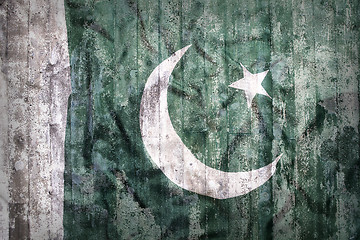 Image showing Grunge style of Pakistan flag on a brick wall     