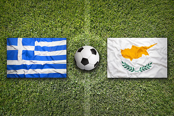 Image showing Greece and Cyprus flags on soccer field