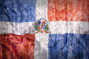 Image showing Grunge style of Dominican Republic flag on a brick wall  