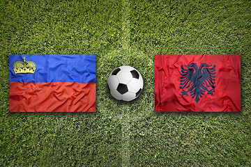 Image showing Liechtenstein and Albania flags on soccer field