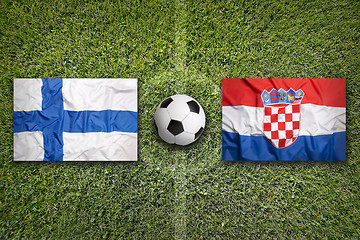 Image showing Finland vs. Croatia flags on soccer field