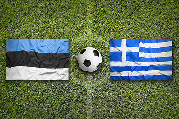 Image showing Estonia vs. Greece flags on soccer field