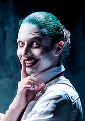 Image showing Bloody Halloween theme: crazy joker face