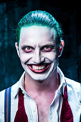 Image showing Bloody Halloween theme: crazy joker face