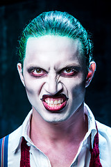 Image showing Bloody Halloween theme: crazy joker face