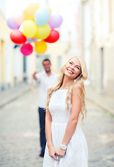 Image showing couple with colorful balloons