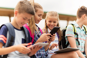 Image showing group of happy elementary school students talking