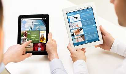 Image showing close up of businessman hands with tablet pc