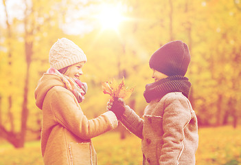 Image showing smiling children in autumn park