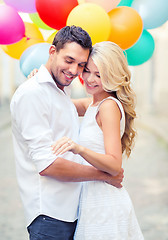 Image showing couple with colorful balloons