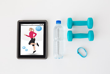 Image showing tablet pc, dumbbells, fitness tracker and bottle