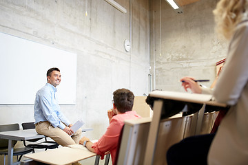 Image showing group of students and teacher at lecture