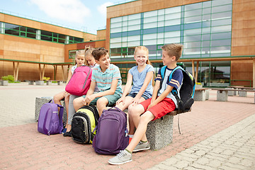 Image showing group of happy elementary school students talking