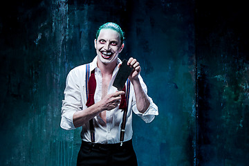 Image showing Bloody Halloween theme: crazy joker face