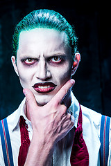 Image showing Bloody Halloween theme: crazy joker face