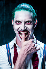 Image showing Bloody Halloween theme: crazy joker face