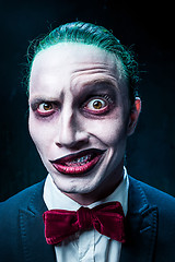 Image showing Bloody Halloween theme: crazy joker face