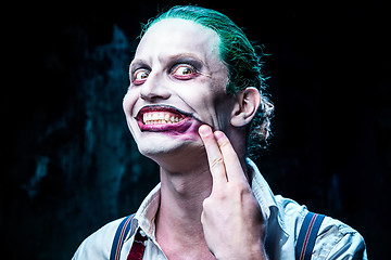 Image showing Bloody Halloween theme: crazy joker face