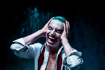 Image showing Bloody Halloween theme: crazy joker face