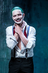 Image showing Bloody Halloween theme: crazy joker face