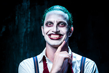 Image showing Bloody Halloween theme: crazy joker face