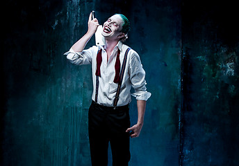 Image showing Bloody Halloween theme: crazy joker face