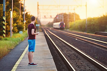 Image showing Railway station at the sunset