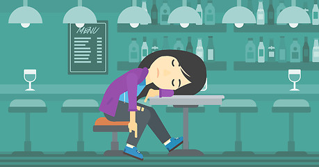 Image showing Drunk woman sleeping in bar.