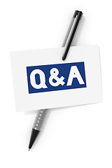 Image showing business card a ball pen and the text questions and answers