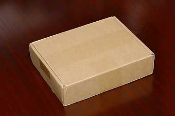 Image showing Cardboard Box on Desk