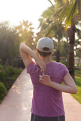 Image showing woman  stretching before morning jogging