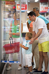 Image showing Family choosing food in supermarket