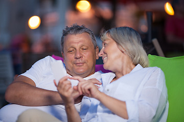 Image showing Loving middle-aged couple having an intimate chat