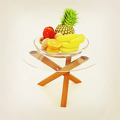 Image showing Citrus in a glass dish on exotic glass table with wooden legs. 3