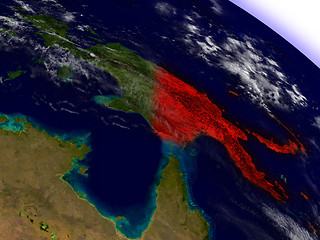 Image showing Papua New Guinea from space highlighted in red